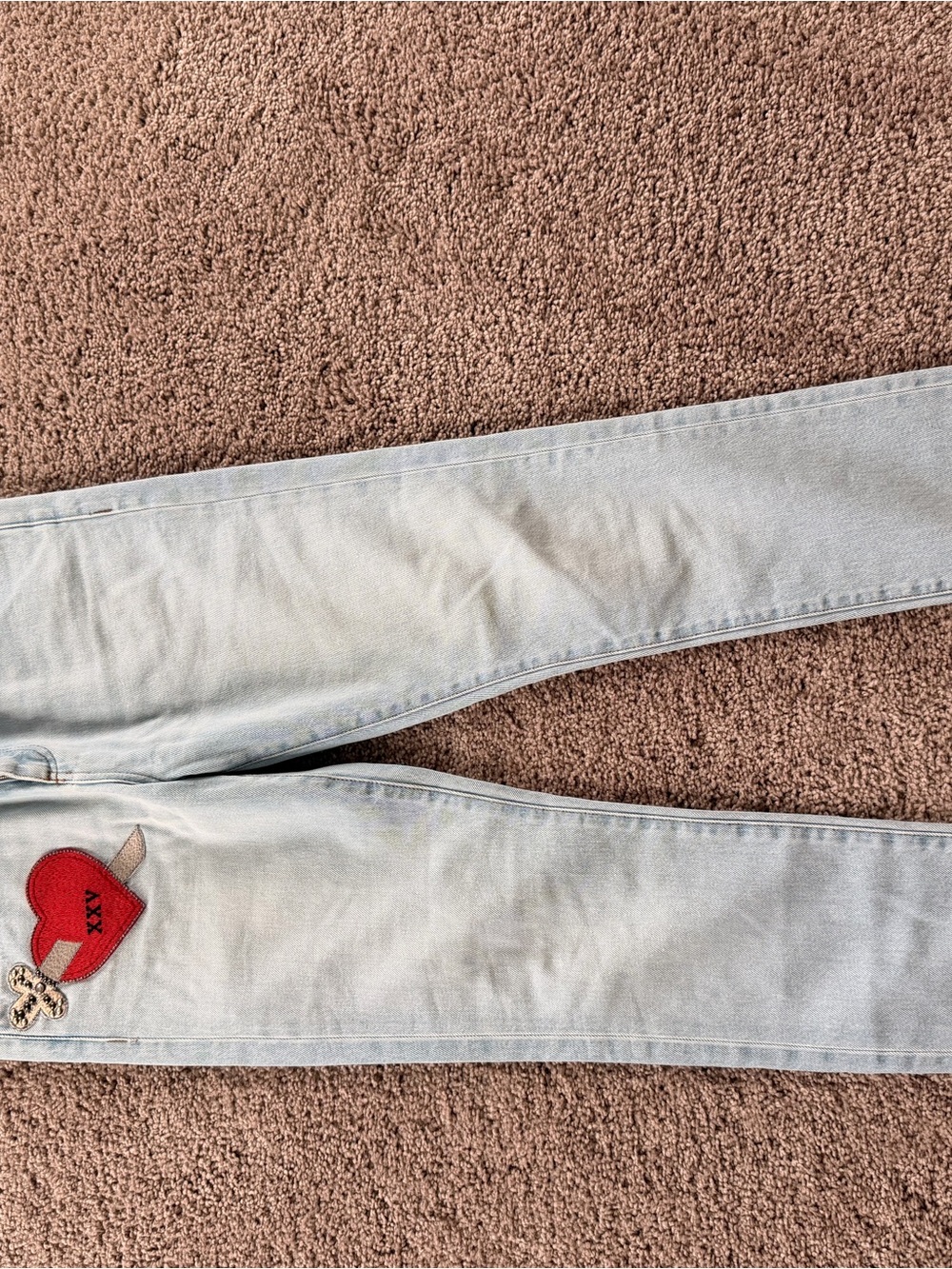 Gucci Light Wash Skinny Jeans with Red Heart Patch